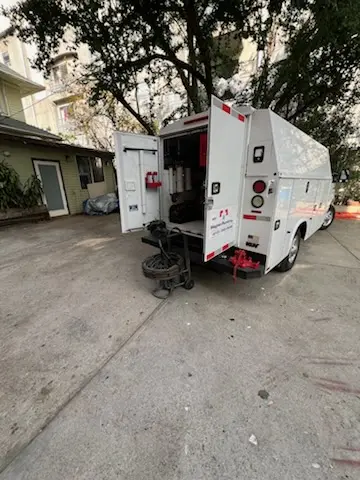 Magnet Plumbing service vehicle on-site for Water Heater Repair in Country Club Trail